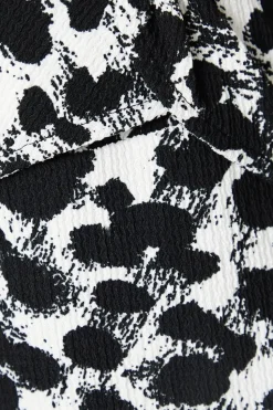 Angel Sleeve Knot Detail Top