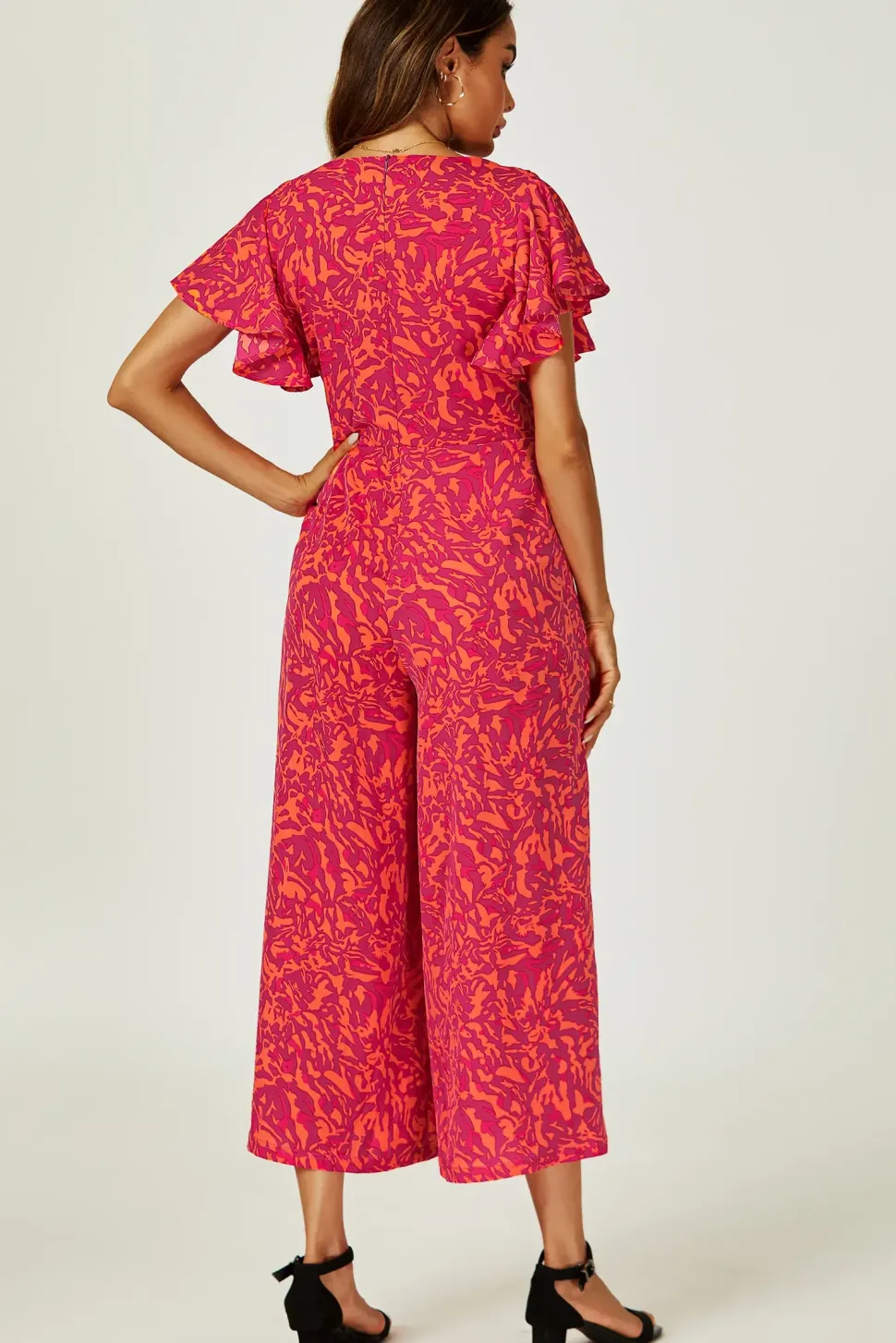 Angel Sleeve Twist Jumpsuit In Fuchsia