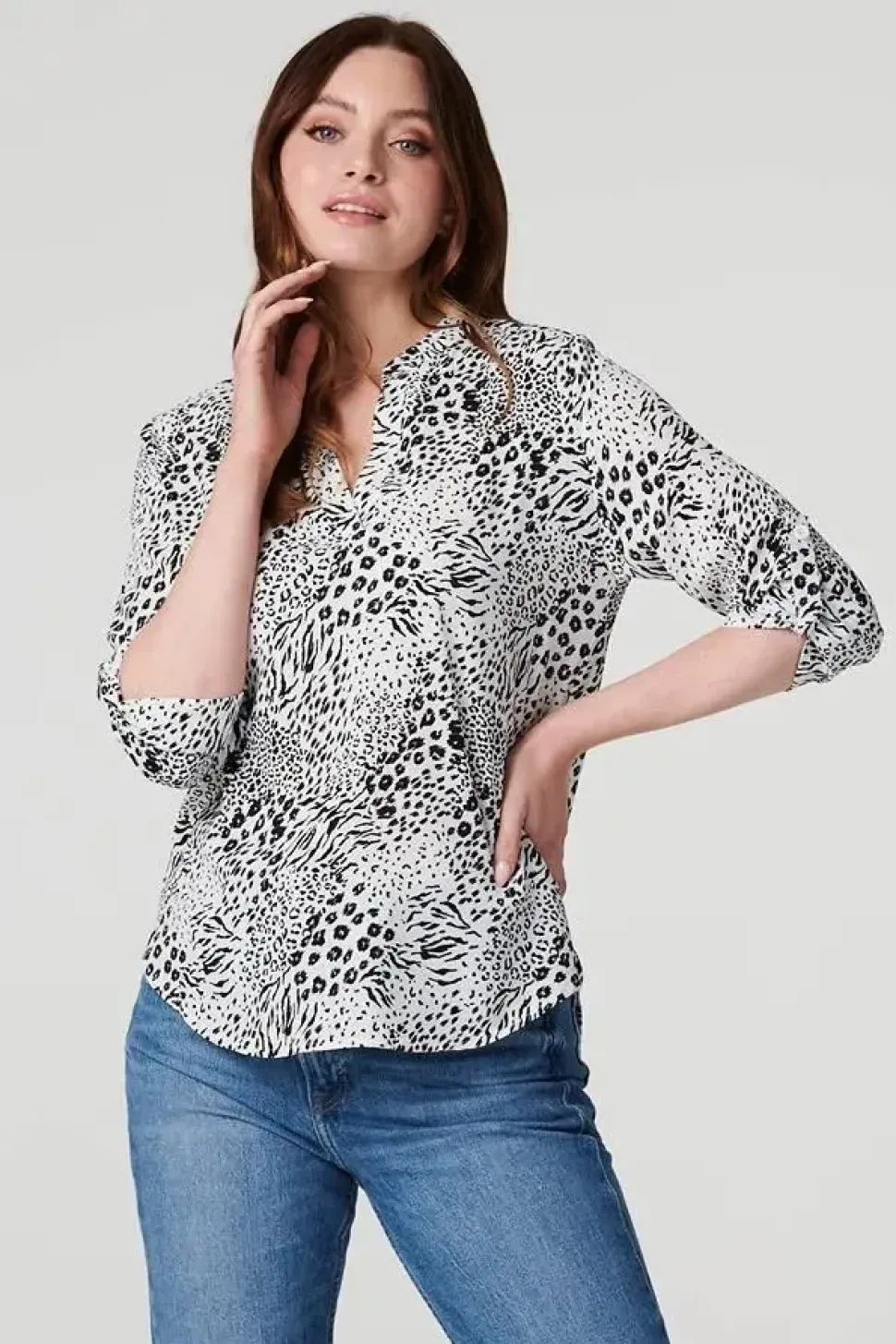 Animal Print Curve Hem Blouse
