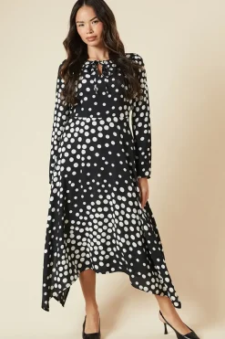 Black Spot tie front hanky hem dress
