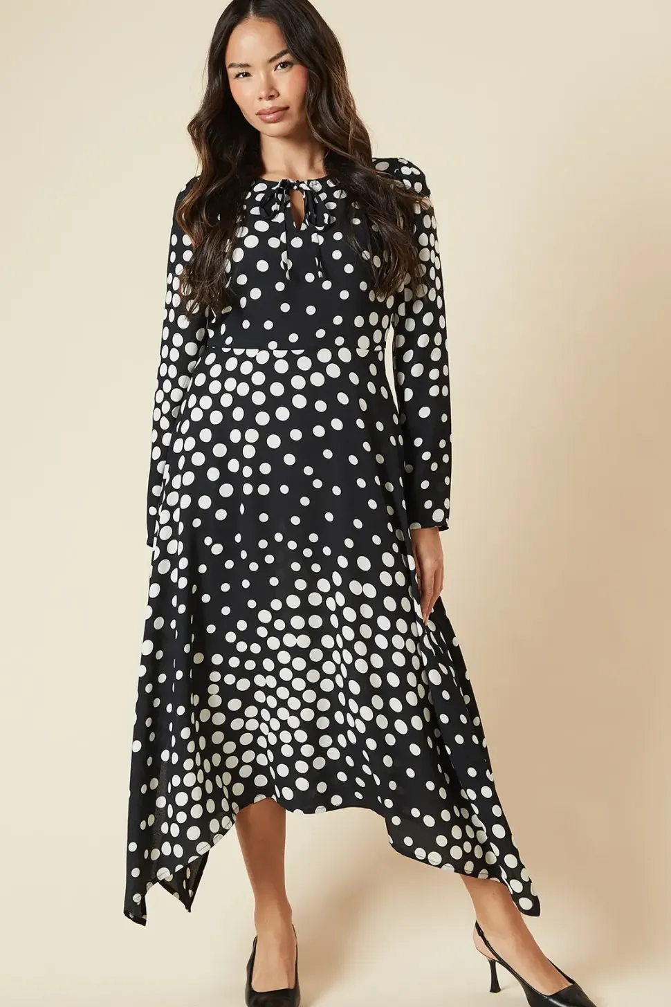 Black Spot tie front hanky hem dress