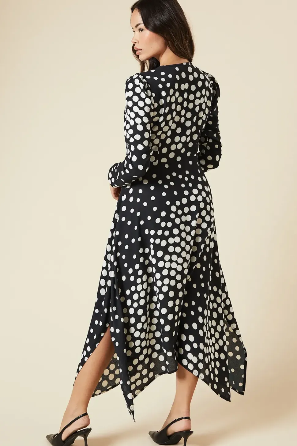 Black Spot tie front hanky hem dress