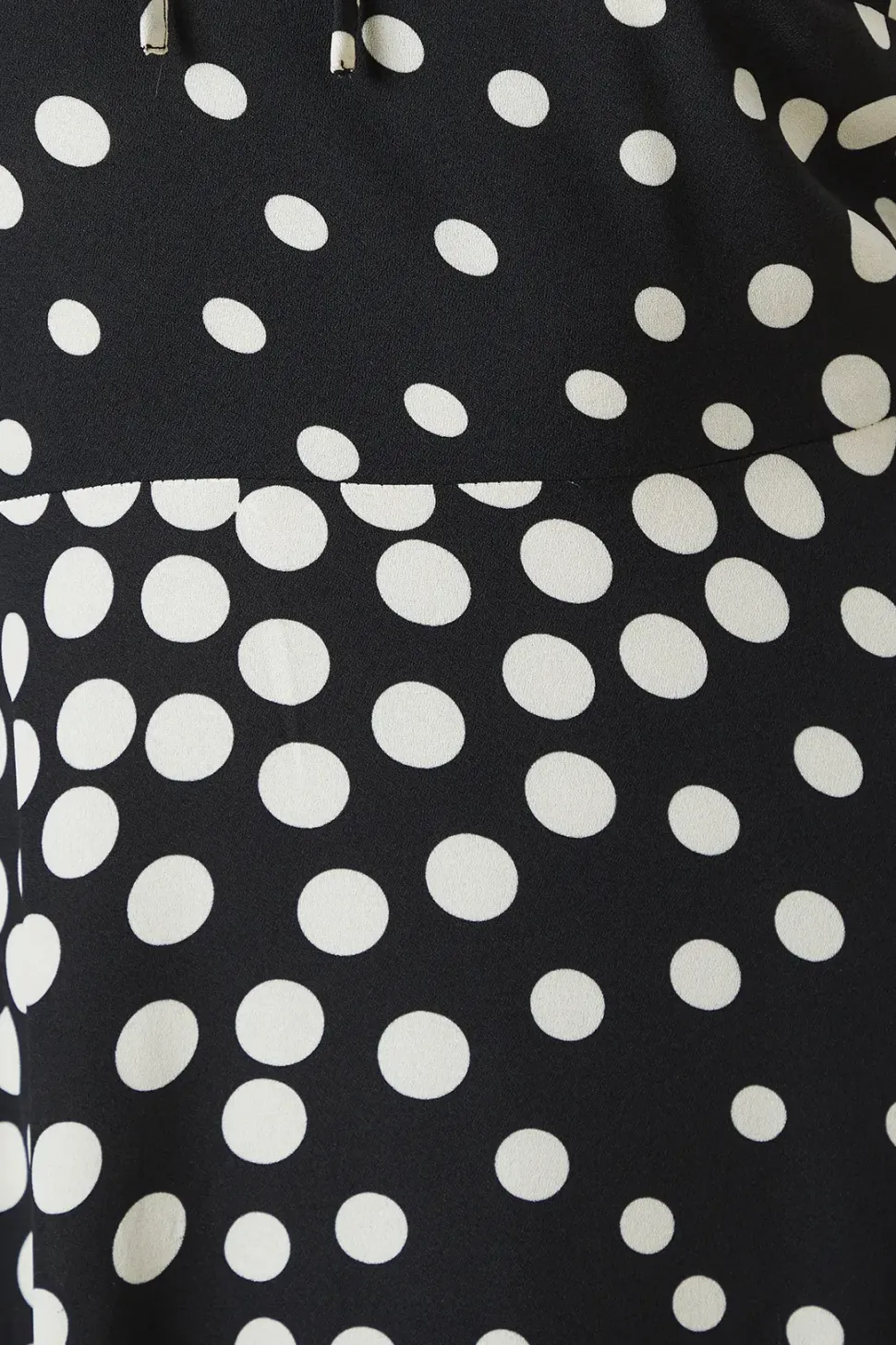Black Spot tie front hanky hem dress