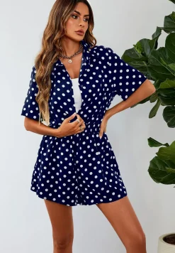 Button Down Playsuit In Navy With White Polka Dot Print