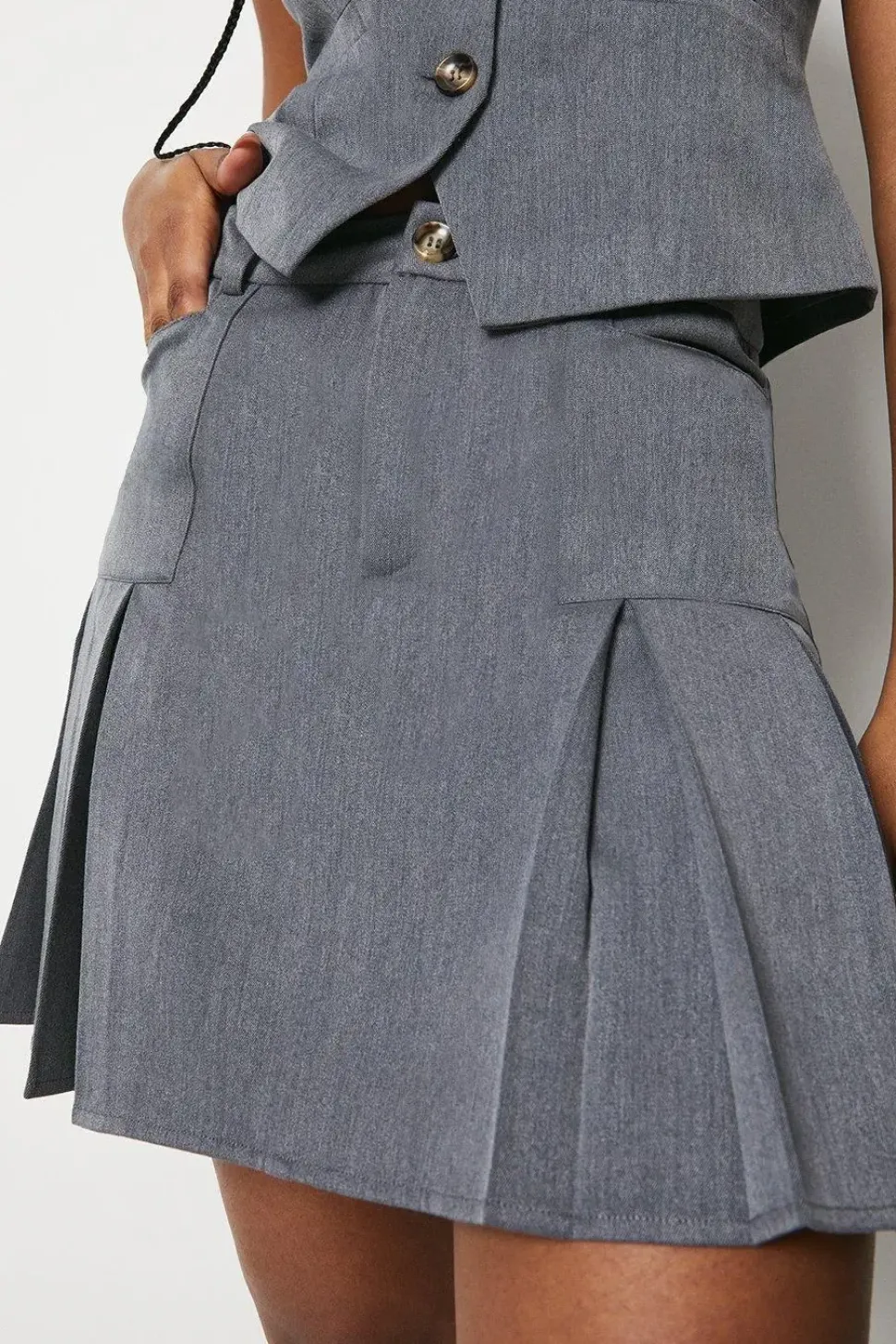 Kick Pleat Tailored Mini Skirt