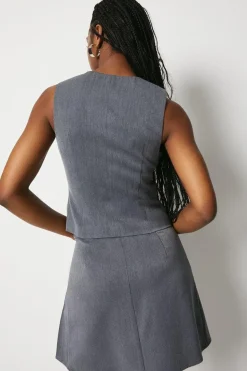 Kick Pleat Tailored Mini Skirt