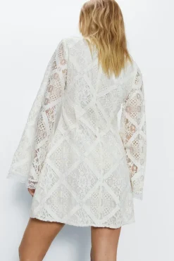 Lace Covered Button Flared Sleeve Mini Dress
