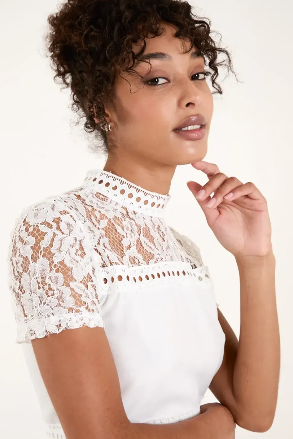 Lace Trimmed Peplum Top