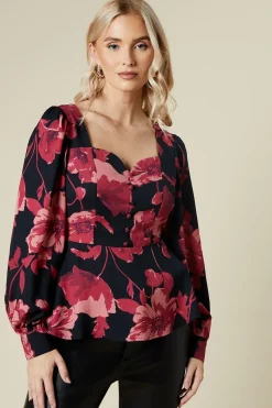large pink floral button front blouse