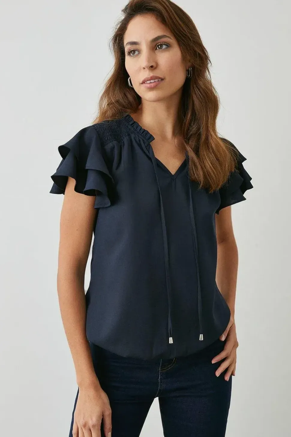 Navy Bubble Hem Flute Sleeve Top
