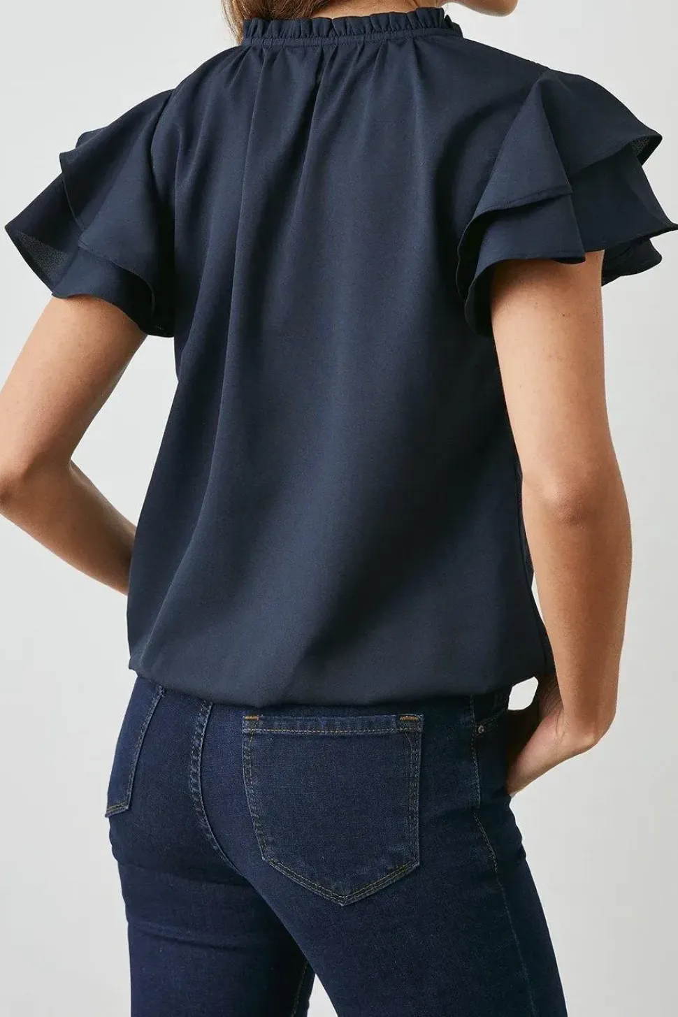 Navy Bubble Hem Flute Sleeve Top