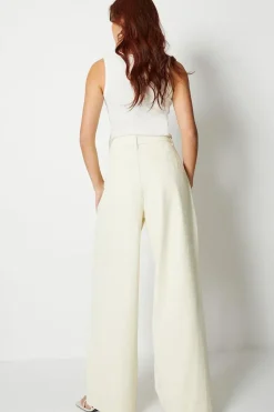 Pleat Front Wide Leg Denim Jeans