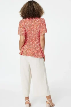 Polka Dot Peplum Blouse