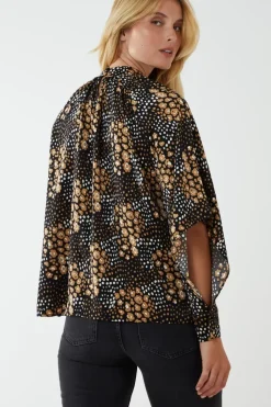 Raglan Cut Out Sleeve Volume Top