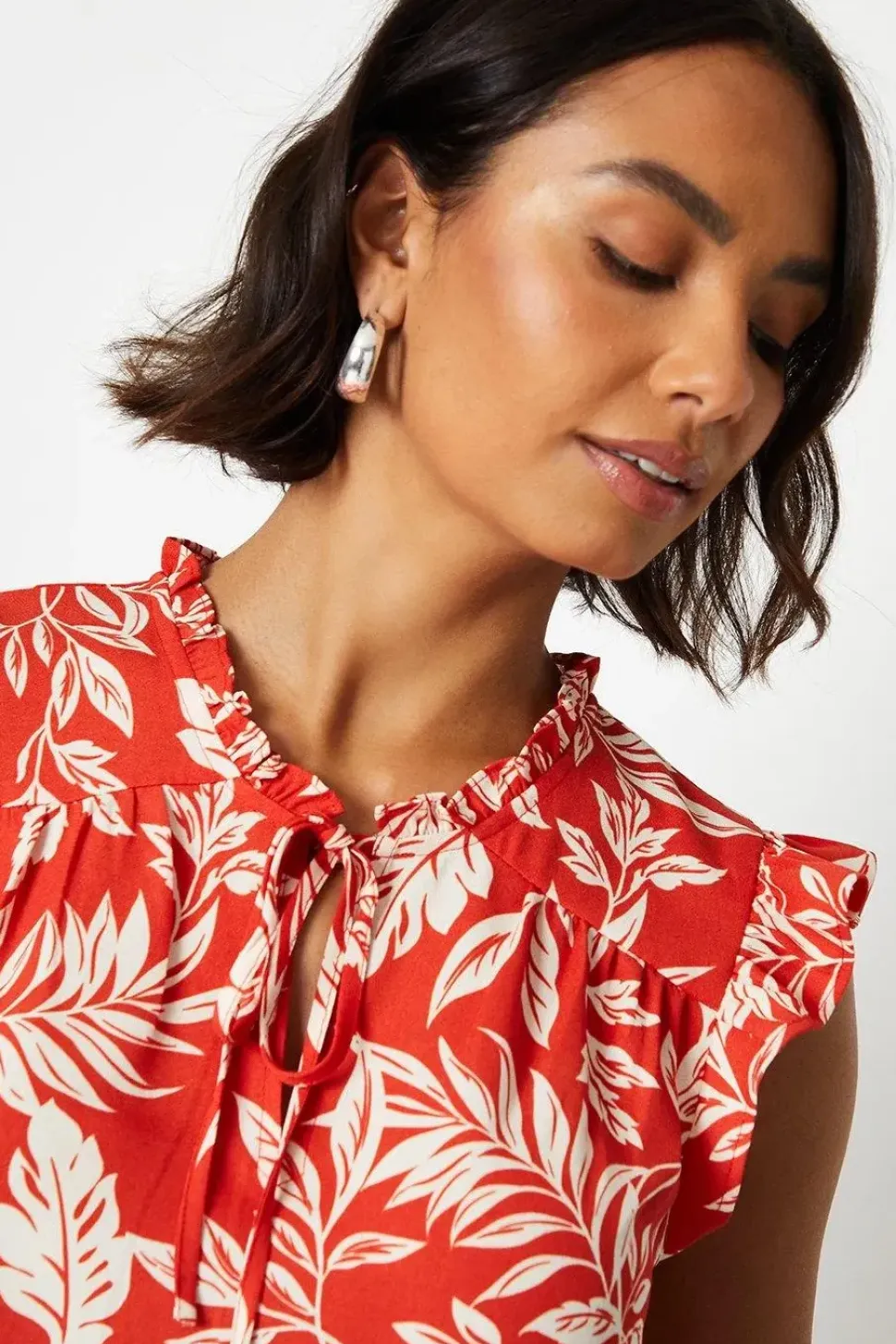 Sleeveless Keyhole Ruffle Blouse
