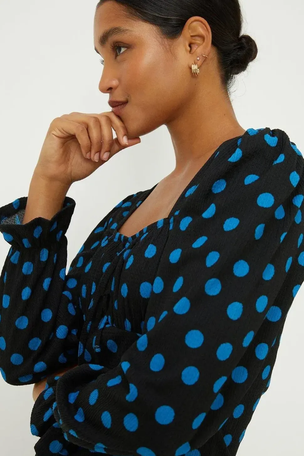 Spot Shirred Cuff Textured Long Sleeve Top