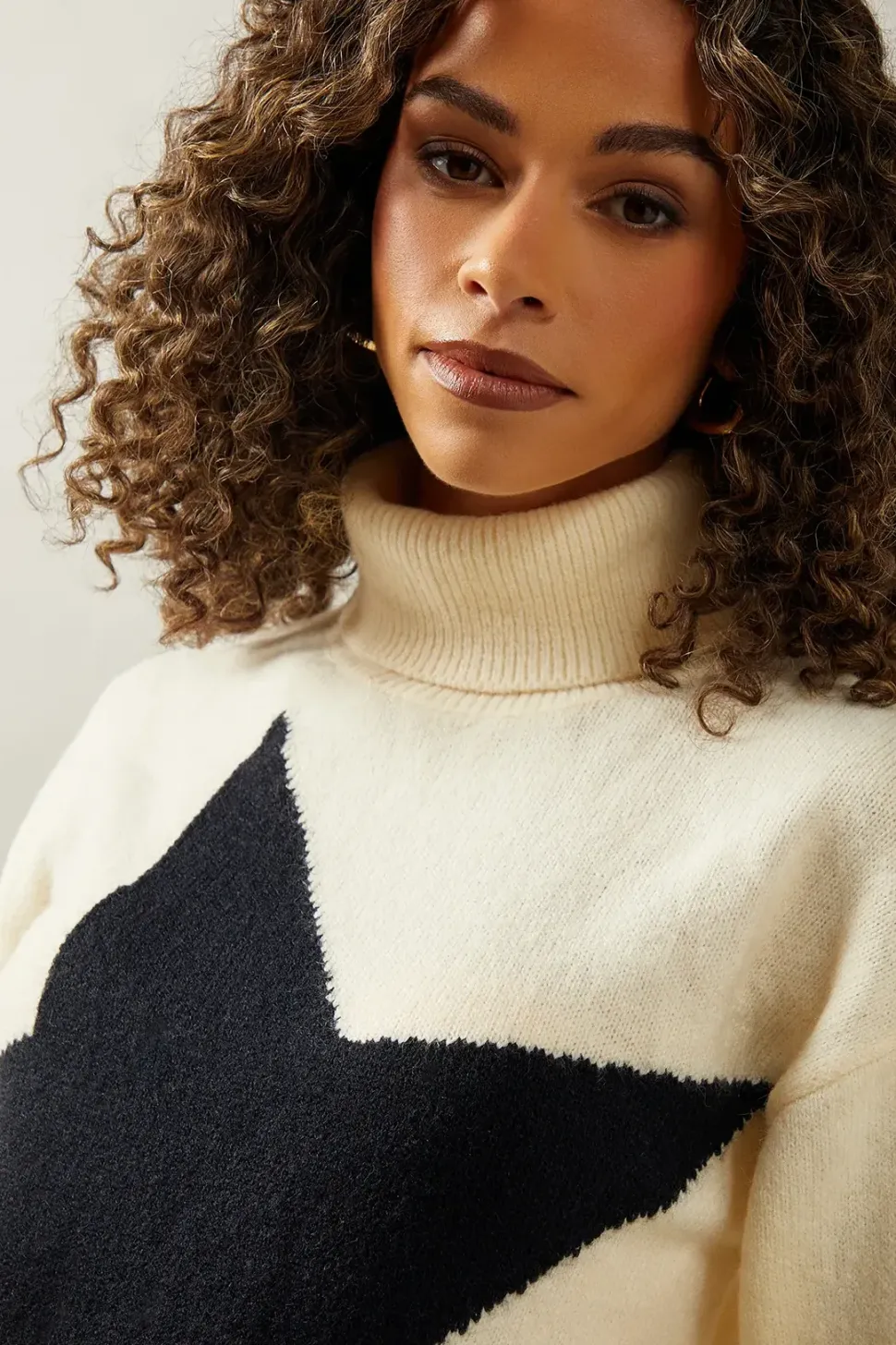 Star Front Roll Neck Jumper