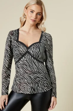 Zebra lace front long sleeve blouse